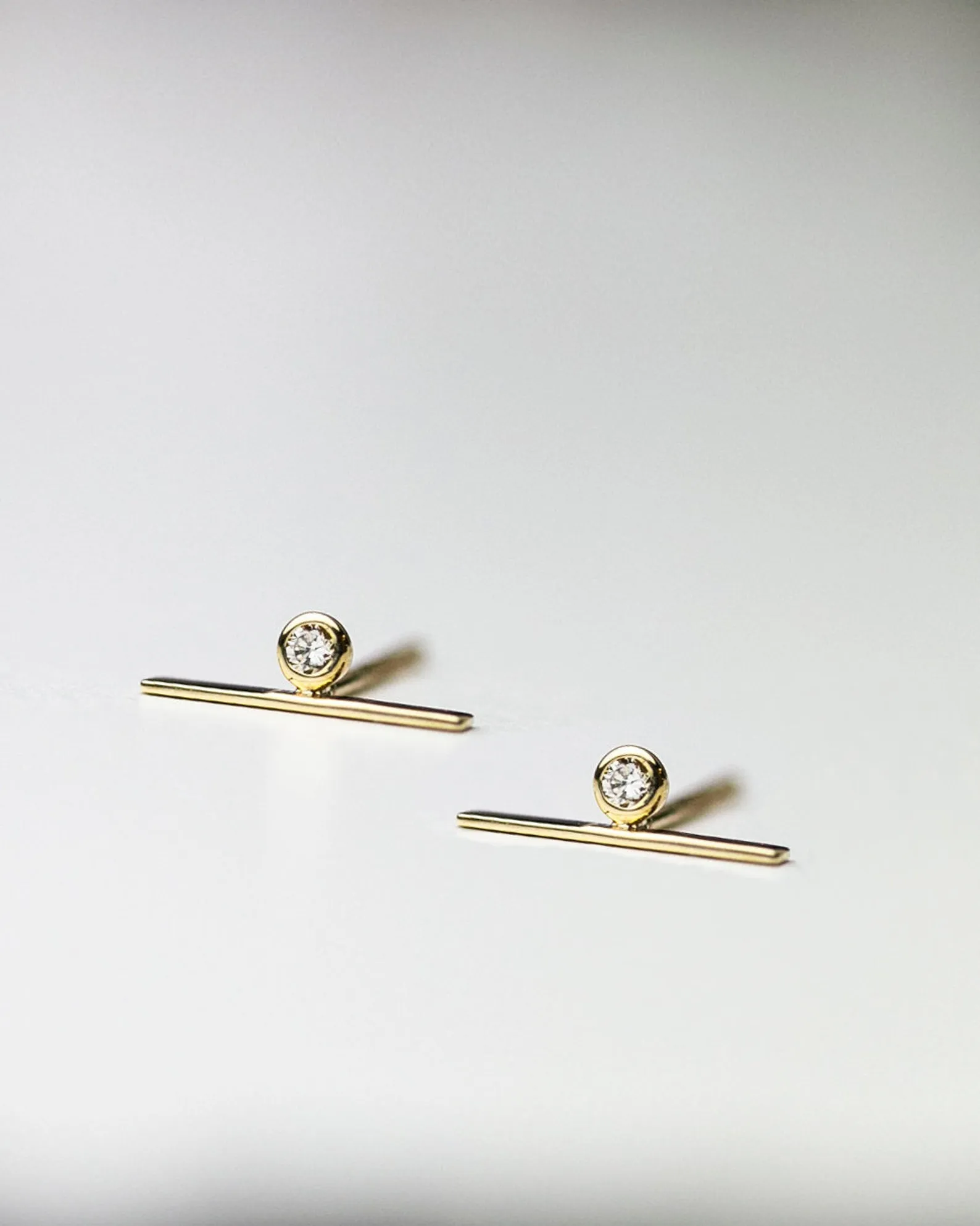 14k Lind bar studs with diamond accent